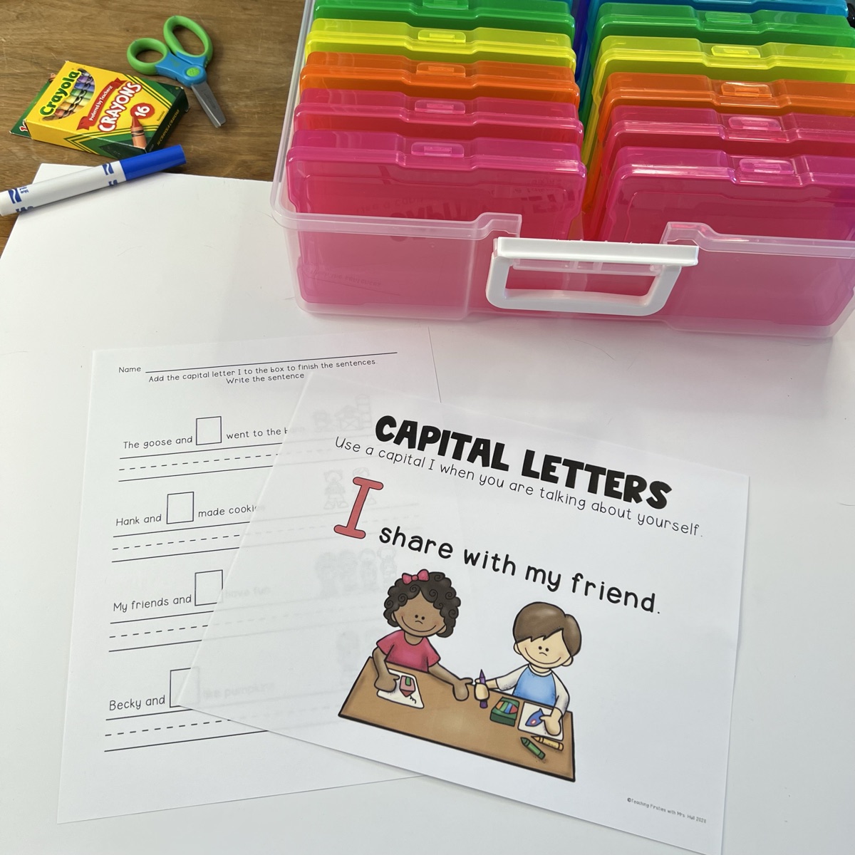 Capital letters anchor chart and pronoun I practice page for first grade